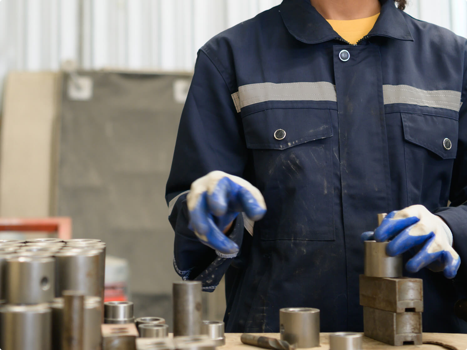 Manufacturing team member working with automation equipment
