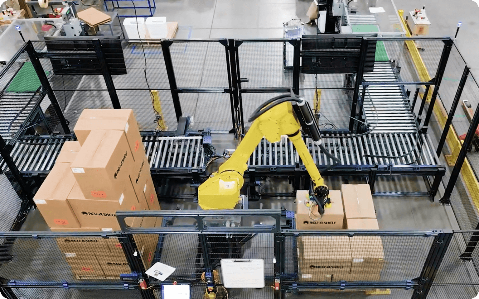 Automating Heavy End-of-Line Stacking with Dual Industrial Palletizers